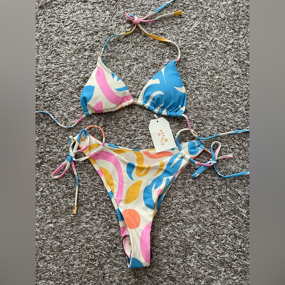Aurelle bikini - tags still on. Size S top and Size M bottom. Cheeky!